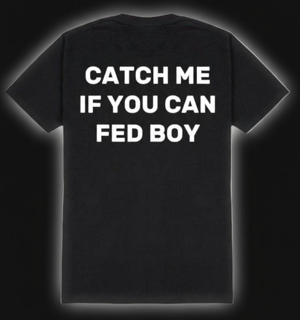 Black t-shirt with white text 'CATCH ME IF YOU CAN FED BOY' on a white background